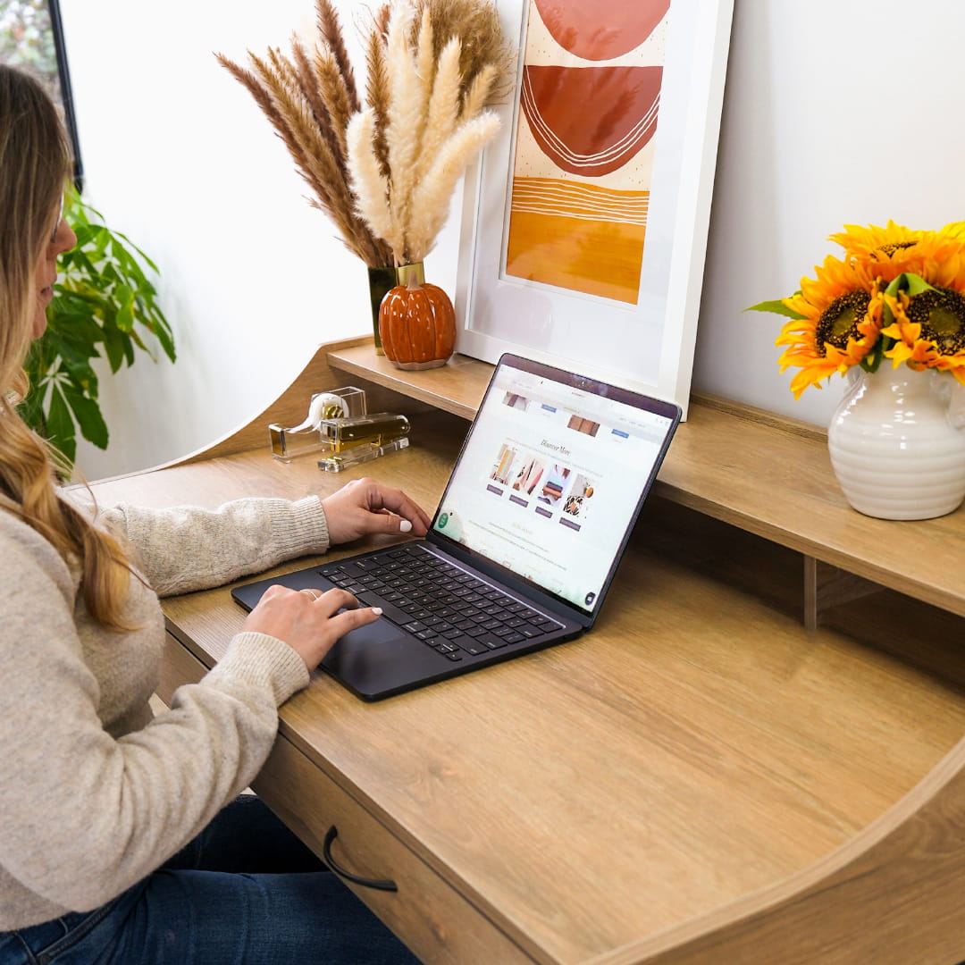 Person sitting down order from Plum Paper website Person sitting down order from Plum Paper website