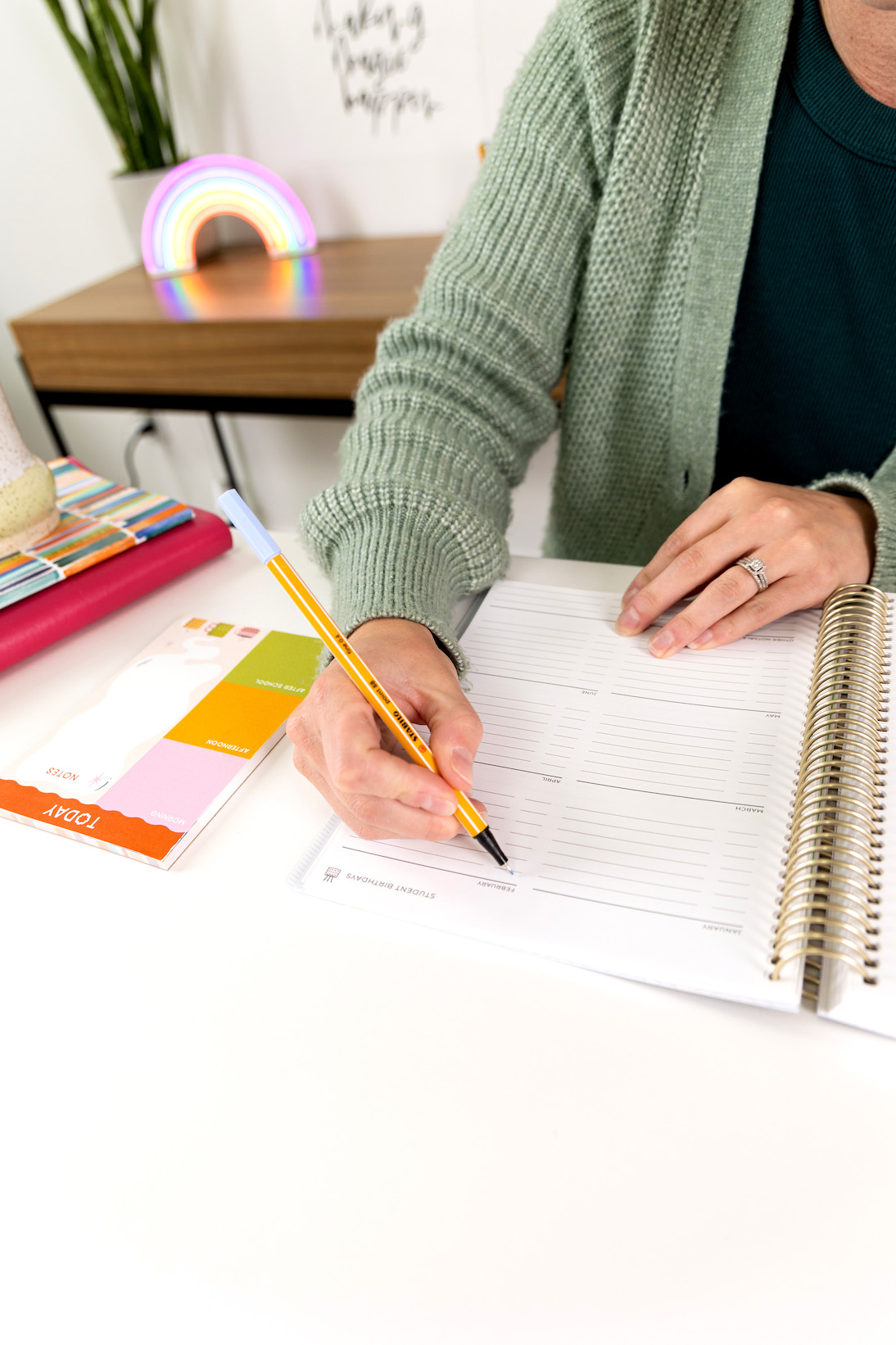 teacher using a planner teacher using a planner