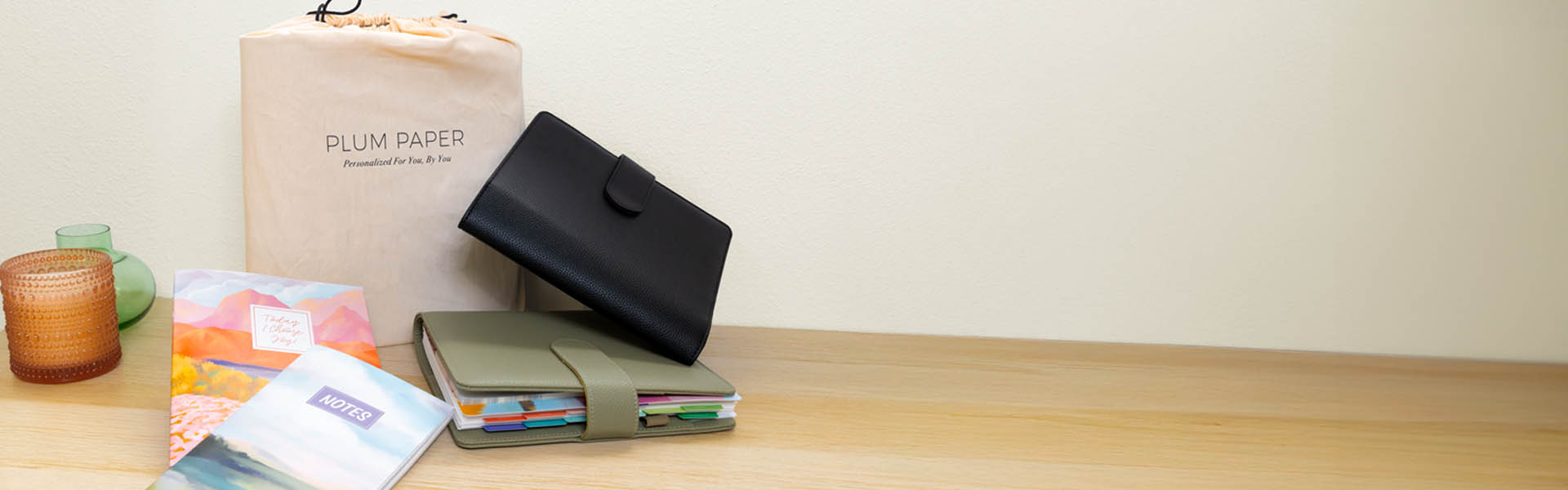 Planners and planner folios displayed on a table Planners and planner folios displayed on a table