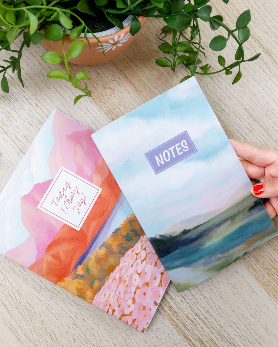 Two planners on table with custom personalization Two planners on table with custom personalization