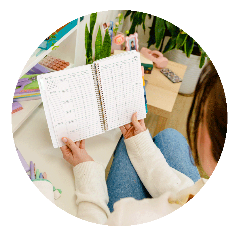 Student using a Plum Paper planner Student using a Plum Paper planner