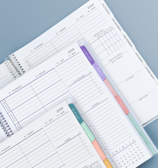 Three Plum paper planners showing different start months Three Plum paper planners showing different start months