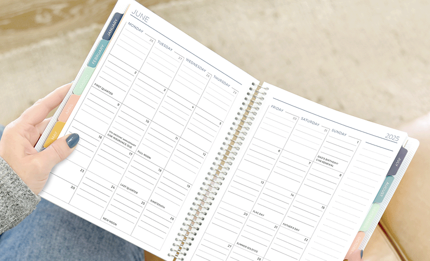 Tabbed Monthly Planner open to monthly spread 