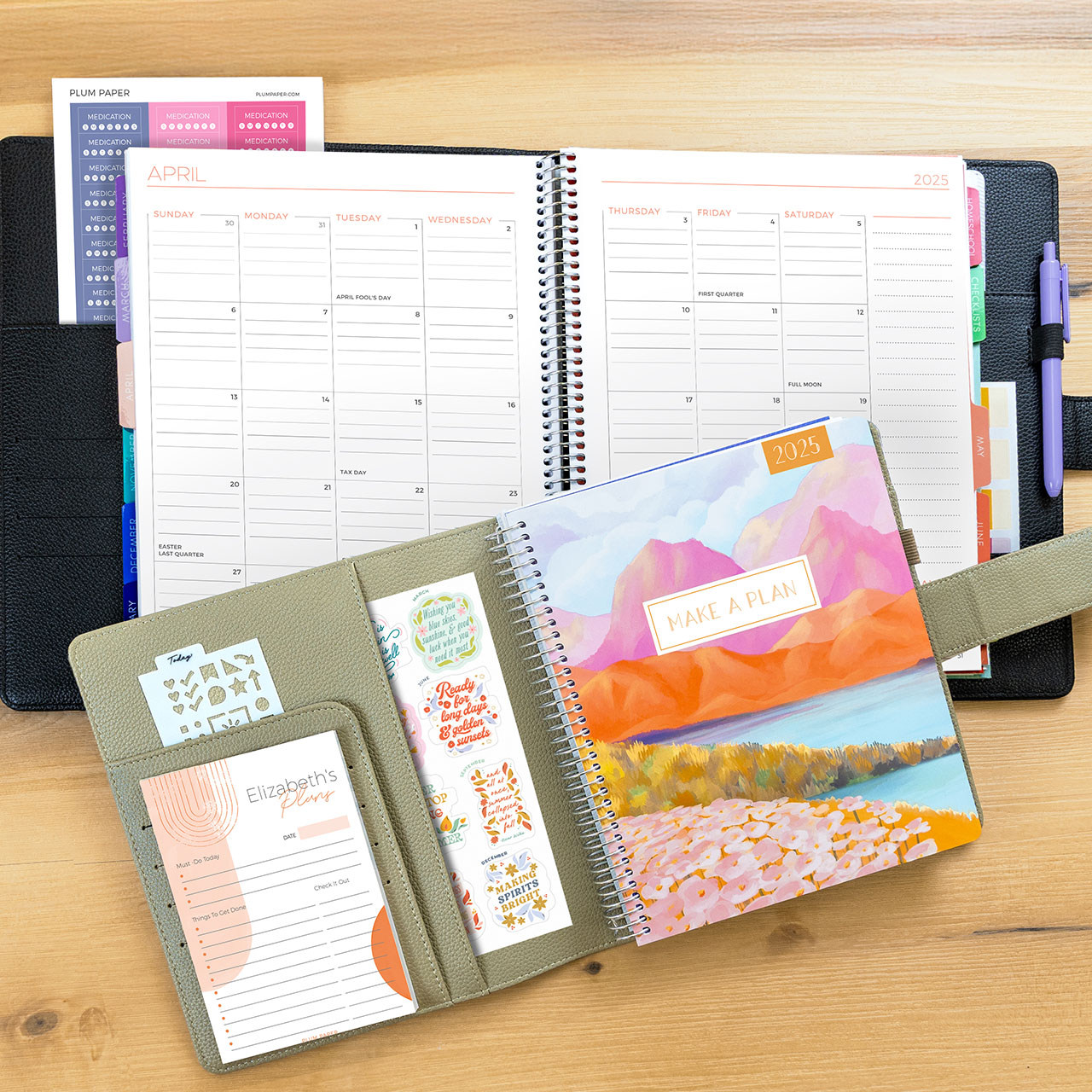 Plum paper's custom planners in folios Plum paper's custom planners in folios