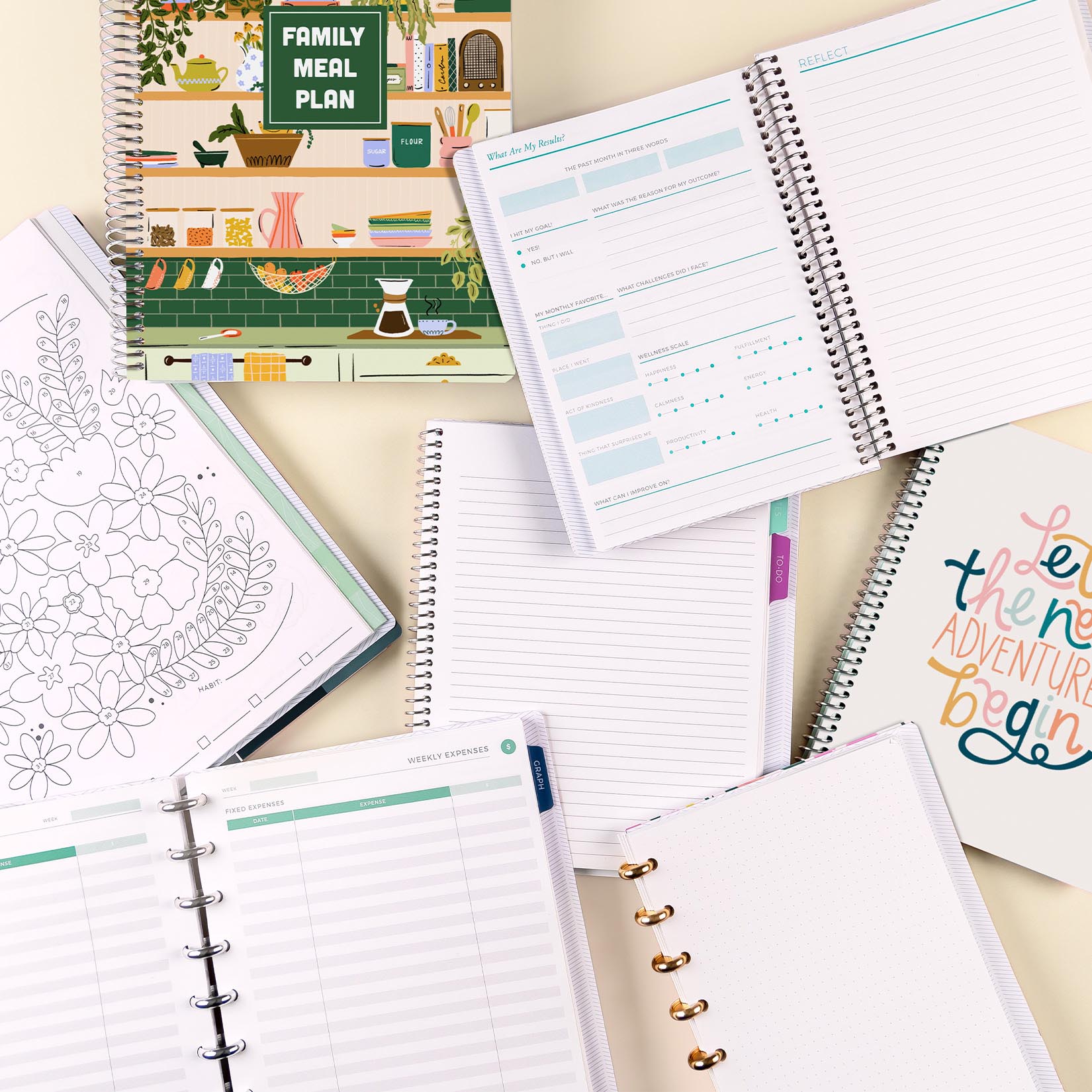 Different Classic and Lifestyle Notebooks laid out on top of each other Different Classic and Lifestyle Notebooks laid out on top of each other