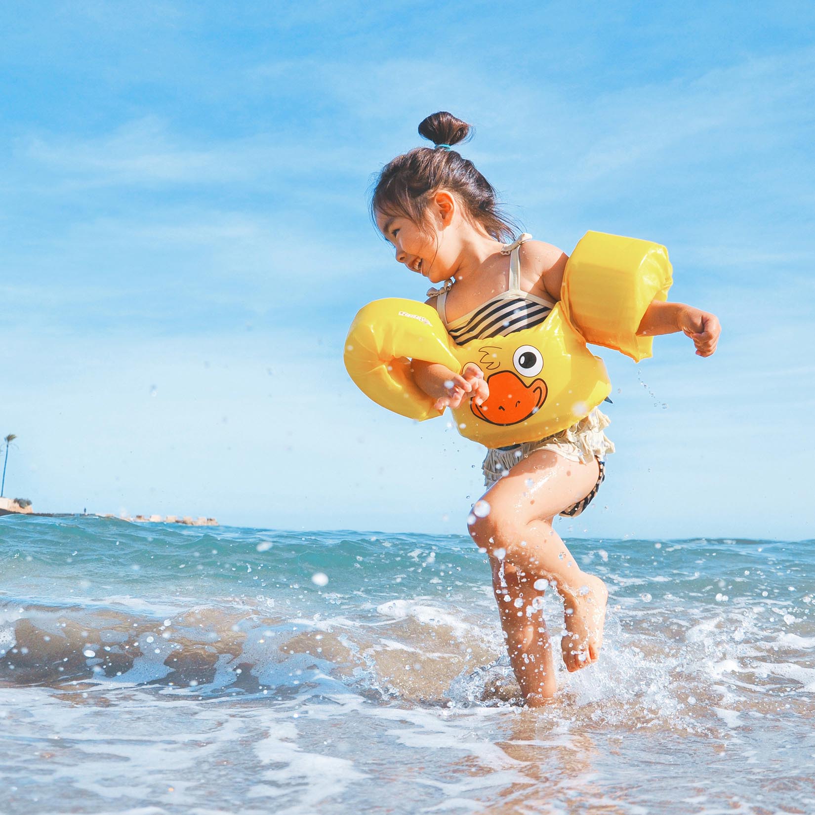 girl holding an Adventure Book while sitting on a couch girl holding an Adventure Book while sitting on a couch