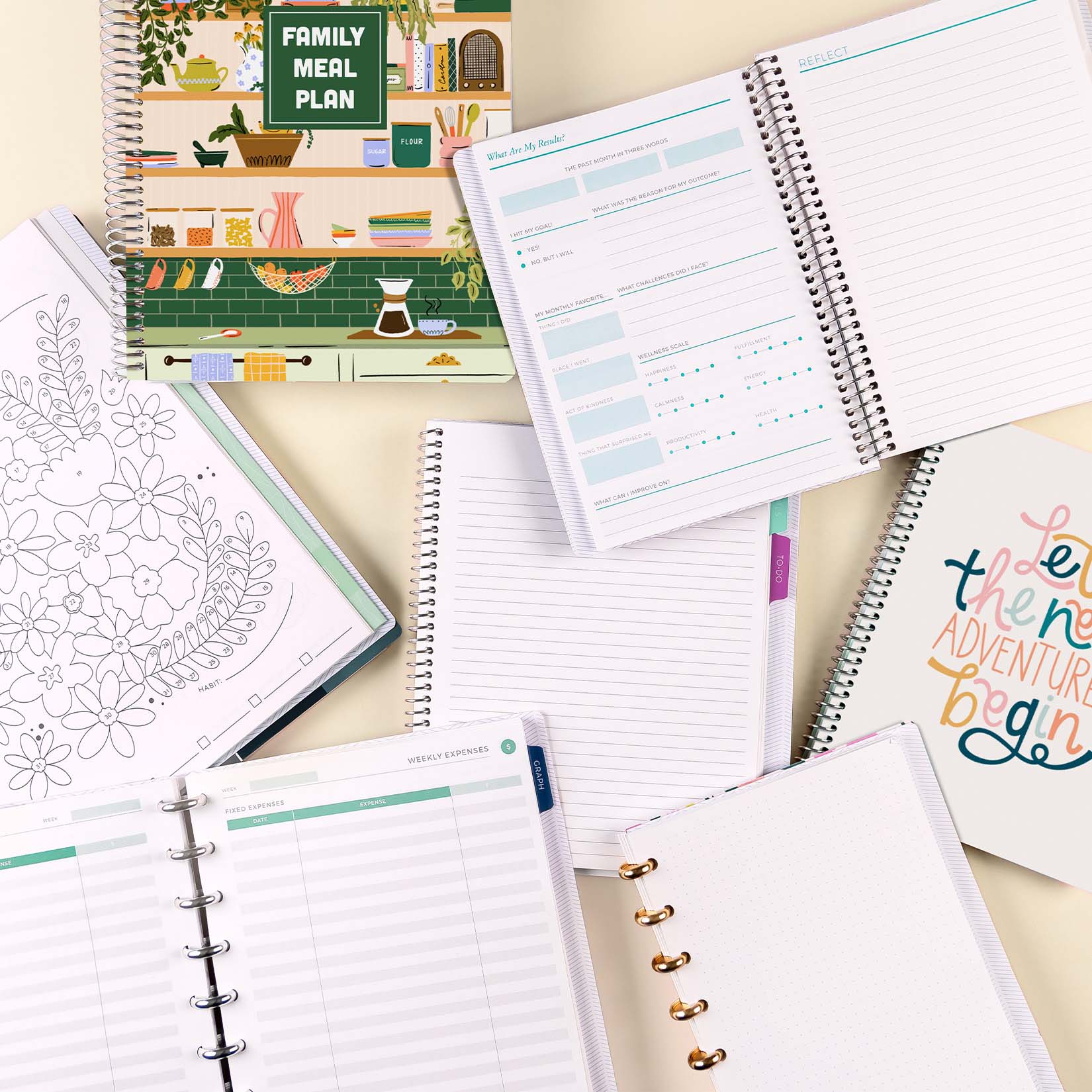 Different Classic and Lifestyle Notebooks laid out on top of each other