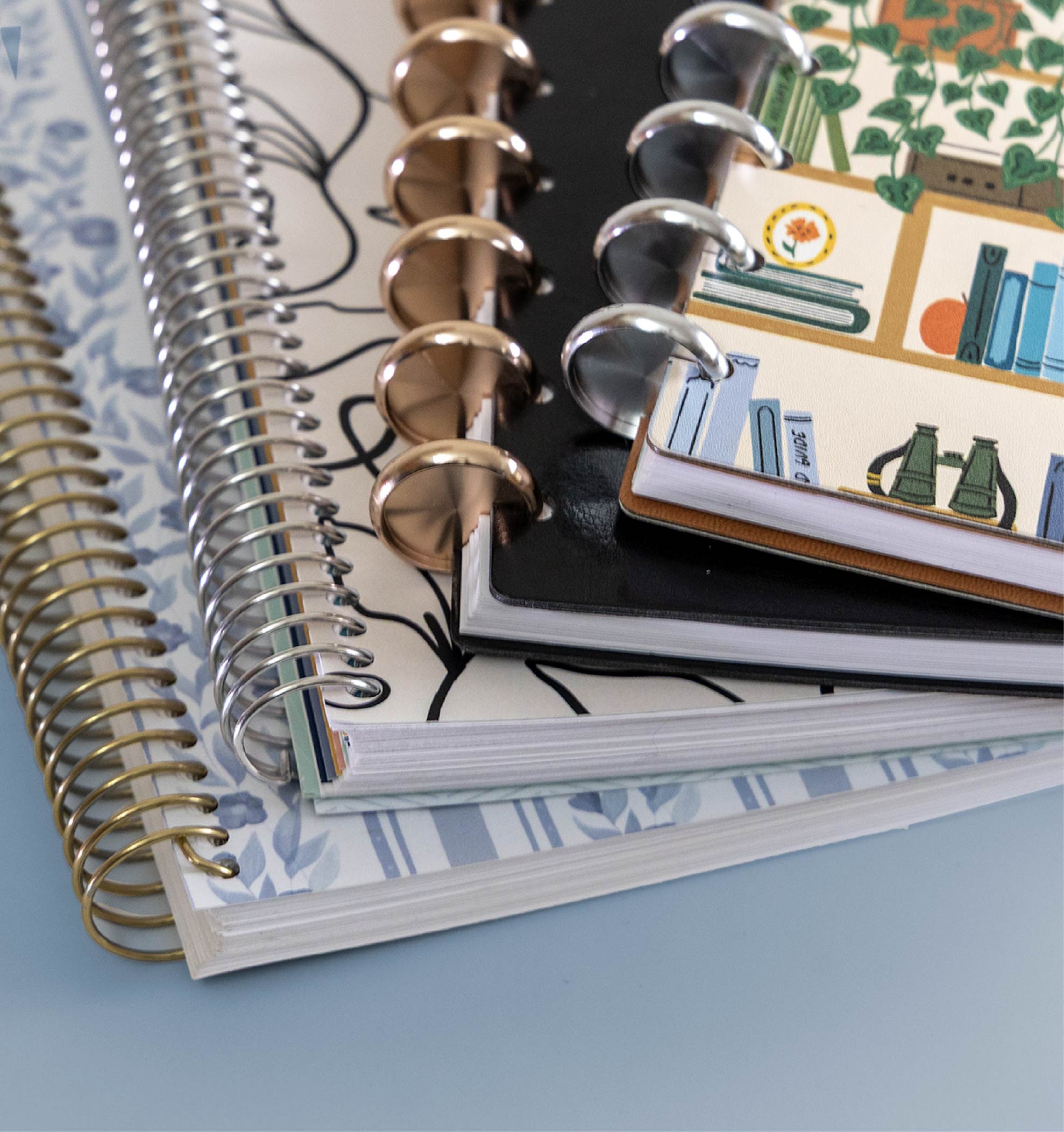 Stack of planners with different binding