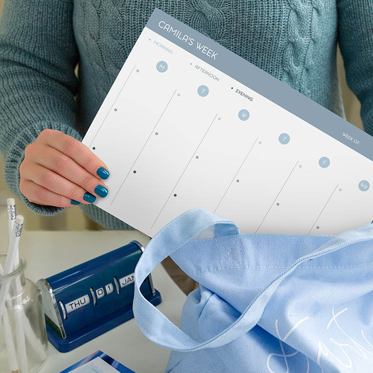 Person holding a Plum Paper custom weekly notepad with a minimalist design — a handmade planner accessory perfect for 2026 organization and personalized stationery lovers. Person holding a Plum Paper custom weekly notepad with a minimalist design — a handmade planner accessory perfect for 2026 organization and personalized stationery lovers.