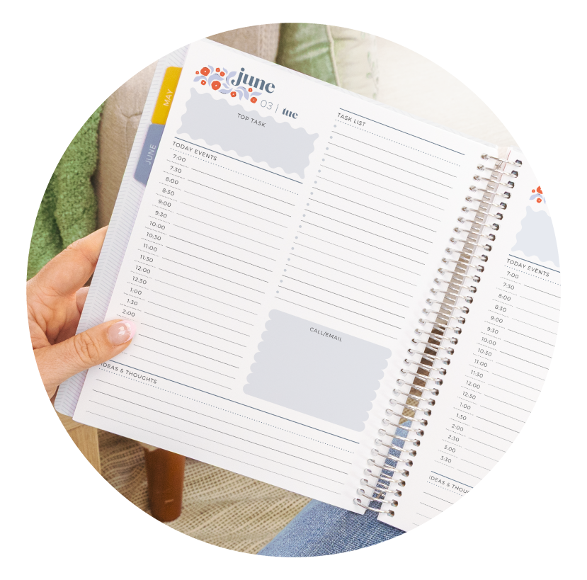 Bright Blooms planner opened to an hourly scheduling page with a colorful floral design, showing time slots arranged vertically for daily planning.