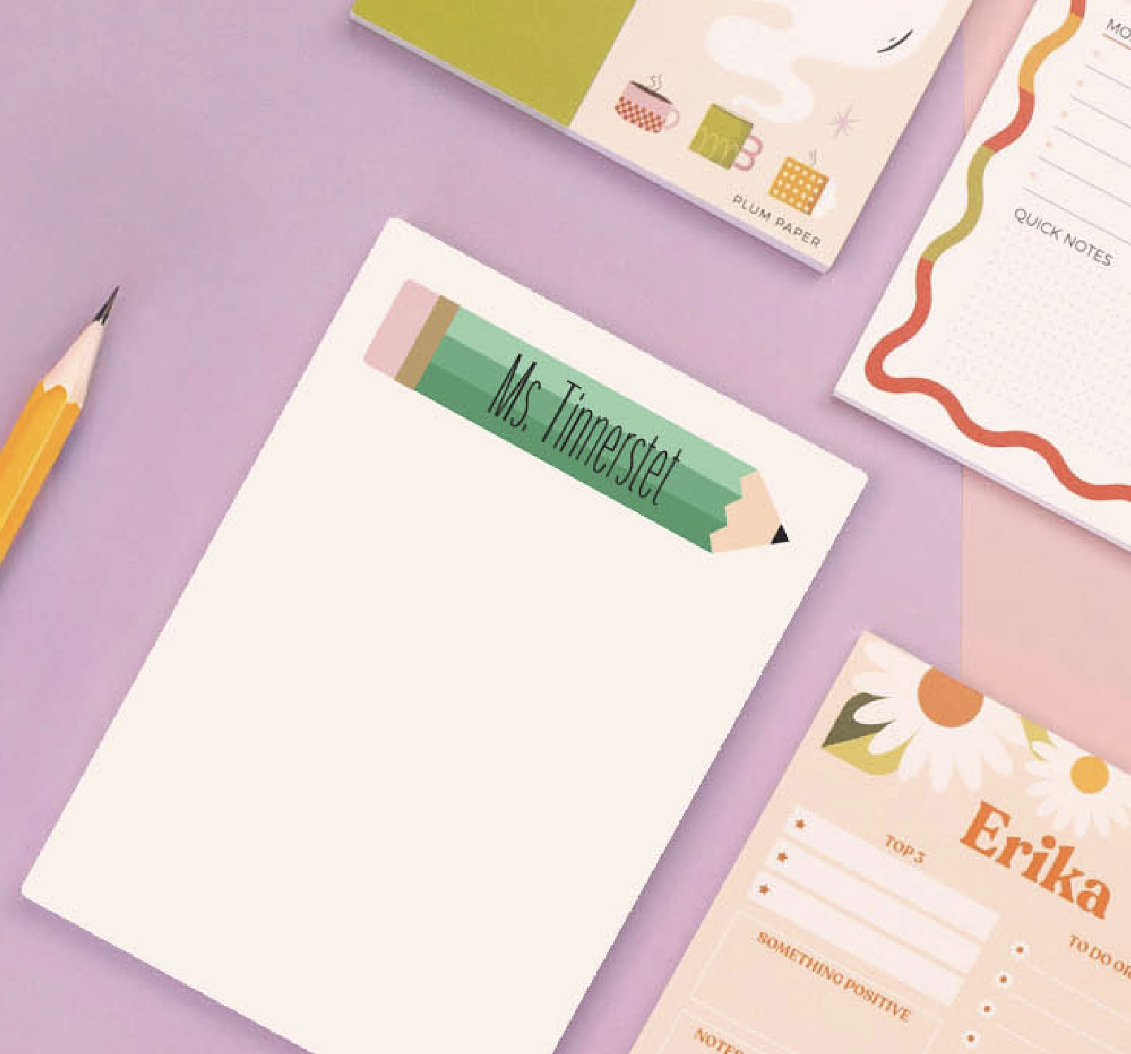 Personalized teacher notepad with custom name and cover design on a classroom desk Personalized teacher notepad with custom name and cover design on a classroom desk