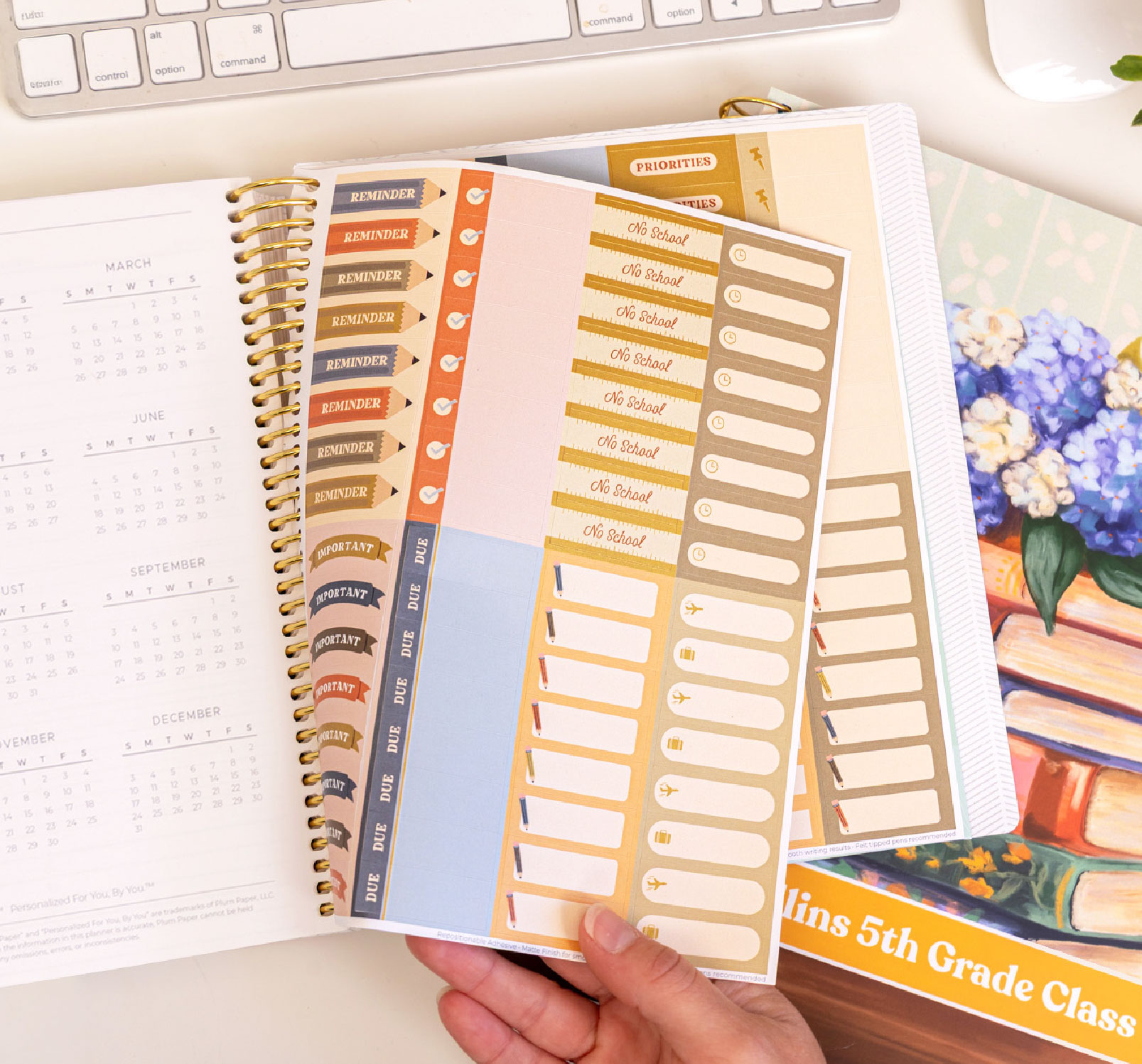 Bound-in academic stickers featuring monthly tabs and label stickers, included with the preset academic planner Bound-in academic stickers featuring monthly tabs and label stickers, included with the preset academic planner