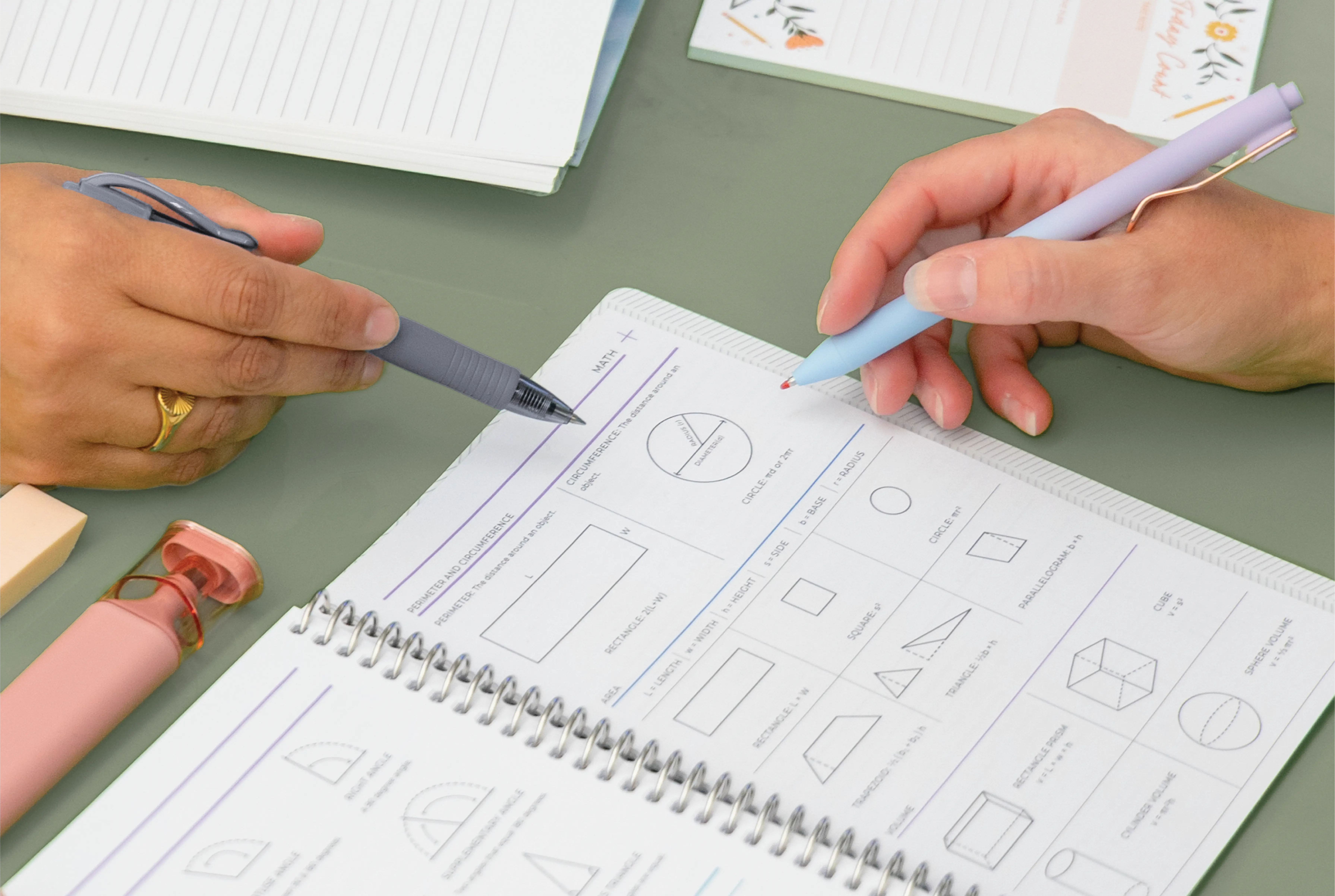 Teacher and Student looking at plum paper planner